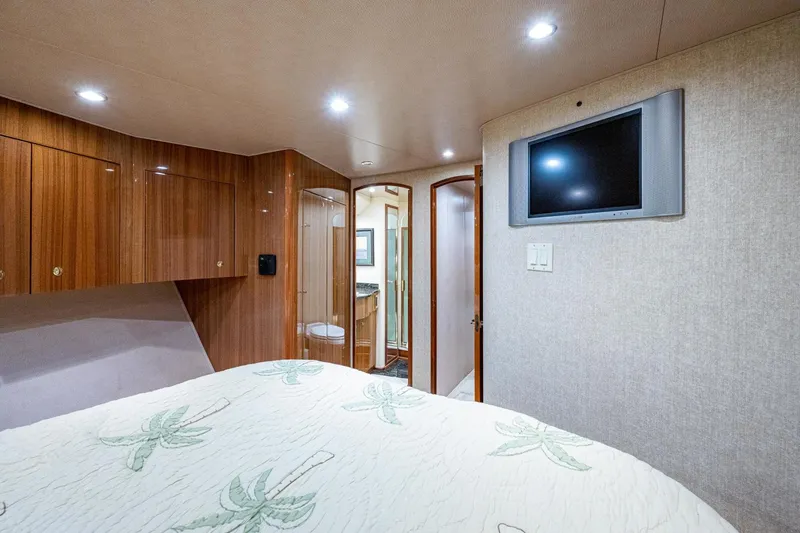 Slide: The Image of Forward Stateroom 2005 Viking 74 Convertible - Reel Estate - 3698335