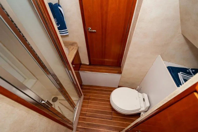 Slide: The Image of 2002 65 Hatteras Convertible Moontan Crew Head - 3712783