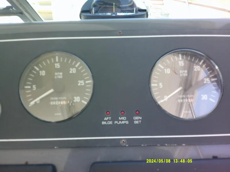 Slide: The Image of Tiara 3100 Open Note the low engine hours - 3706448