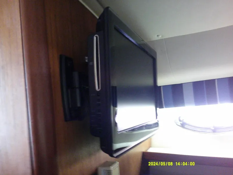 Slide: The Image of Tiara 3100 Open TV Swivels to service Berth & Salon - 3706487