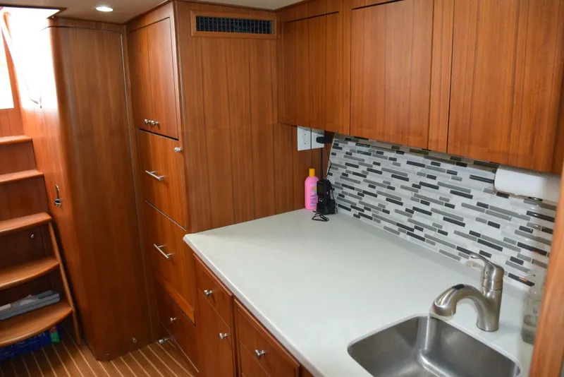 Slide: The Image of  Galley Counter with Glass Tile Backsplash - 3771370