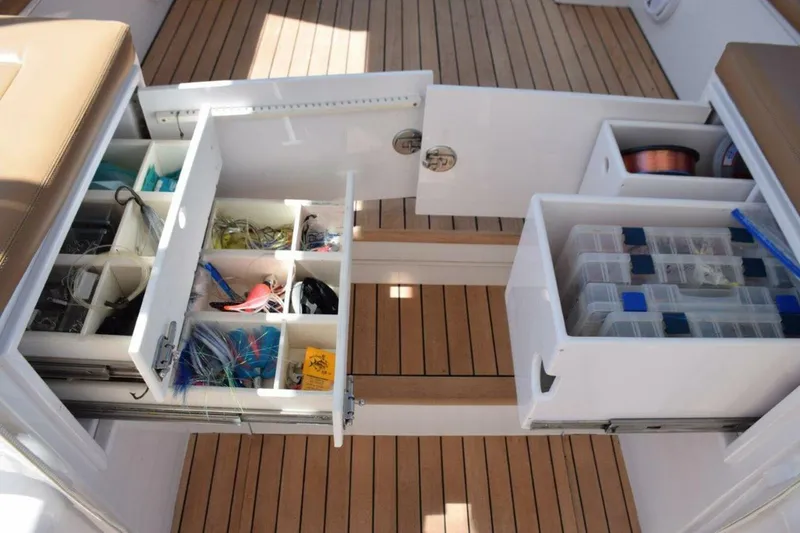 Slide: The Image of Tackle Storage Drawers Just Above Cockpit - 3771416