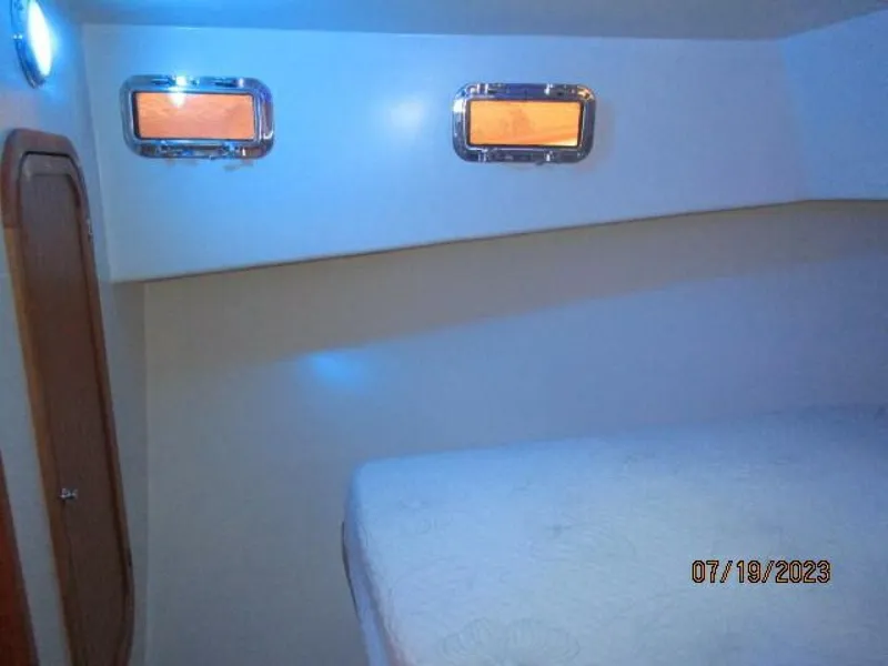 Slide: The Image of 43' Flowers master stateroom port - 3824922