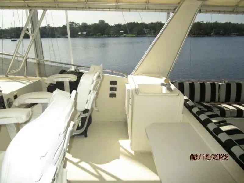 Slide: The Image of 63' Hatteras flybridge starboard - 3904561
