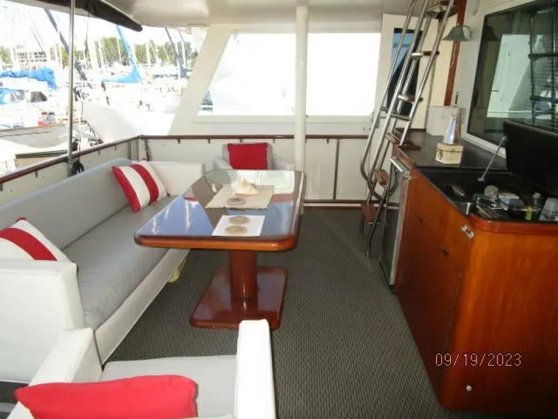 Slide: The Image of 63' Hatteras aftdeck port - 3904541