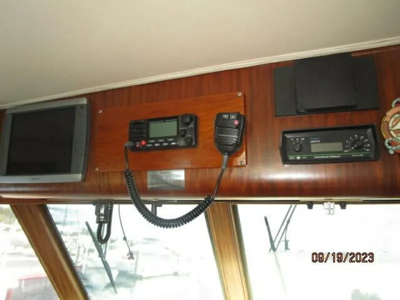 Slide: The Image of 63' Hatteras lower helm electronics2 - 3904591