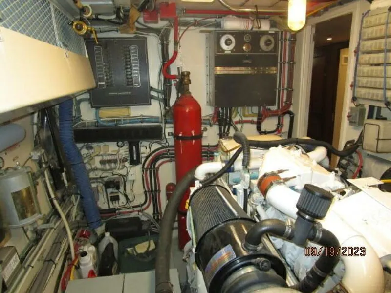 Slide: The Image of 63' Hatteras port engine room forward - 3904602