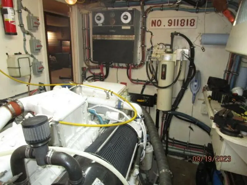 Slide: The Image of 63' Hatteras starboard engine room forward - 3904622