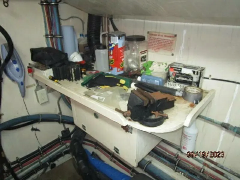 Slide: The Image of 63' Hatteras starboard engine room workbench - 3904623
