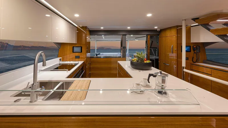 Slide: The Image of Riviera 78 Motor Yacht Galley 02 Gloss Teak Timber Finish - 3944837