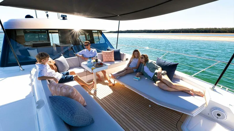Slide: The Image of Riviera 585 SUV Foredeck Lifestyle 04 - 3945173