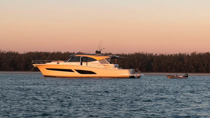 Slide: The Image of Riviera 585 SUV Anchored Sunset 08 - 3945181