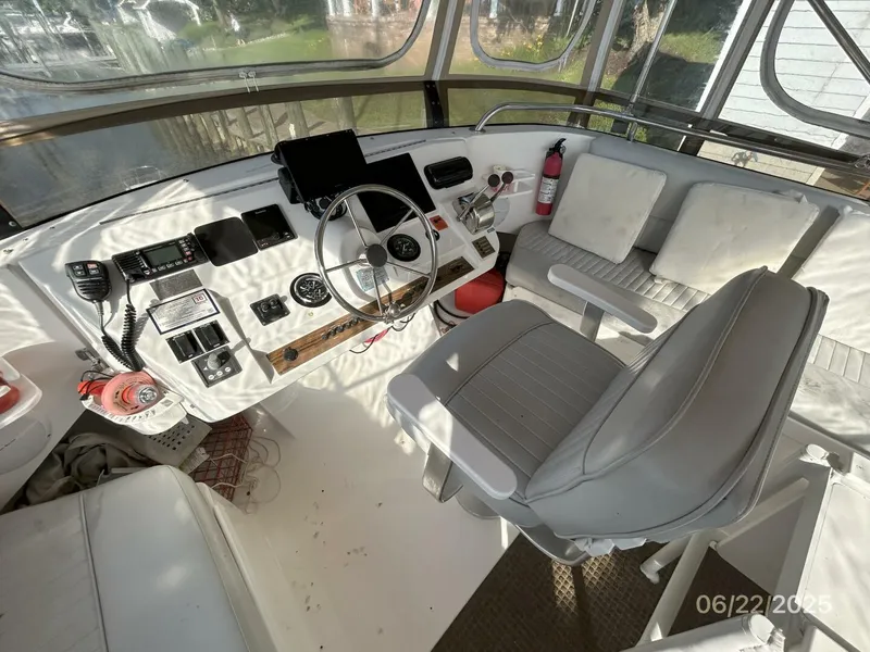 Slide: The Image of 39' Mainship flybridge helm2 - 5435757