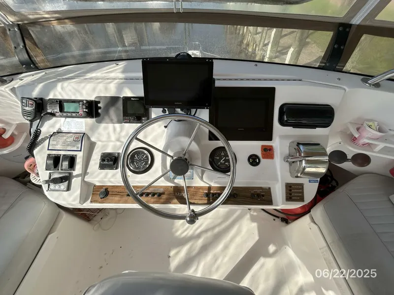 Slide: The Image of 39' Mainship flybridge helm3 - 5435756