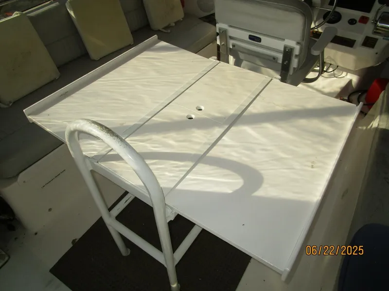 Slide: The Image of 39' Mainship flybridge table - 5435752