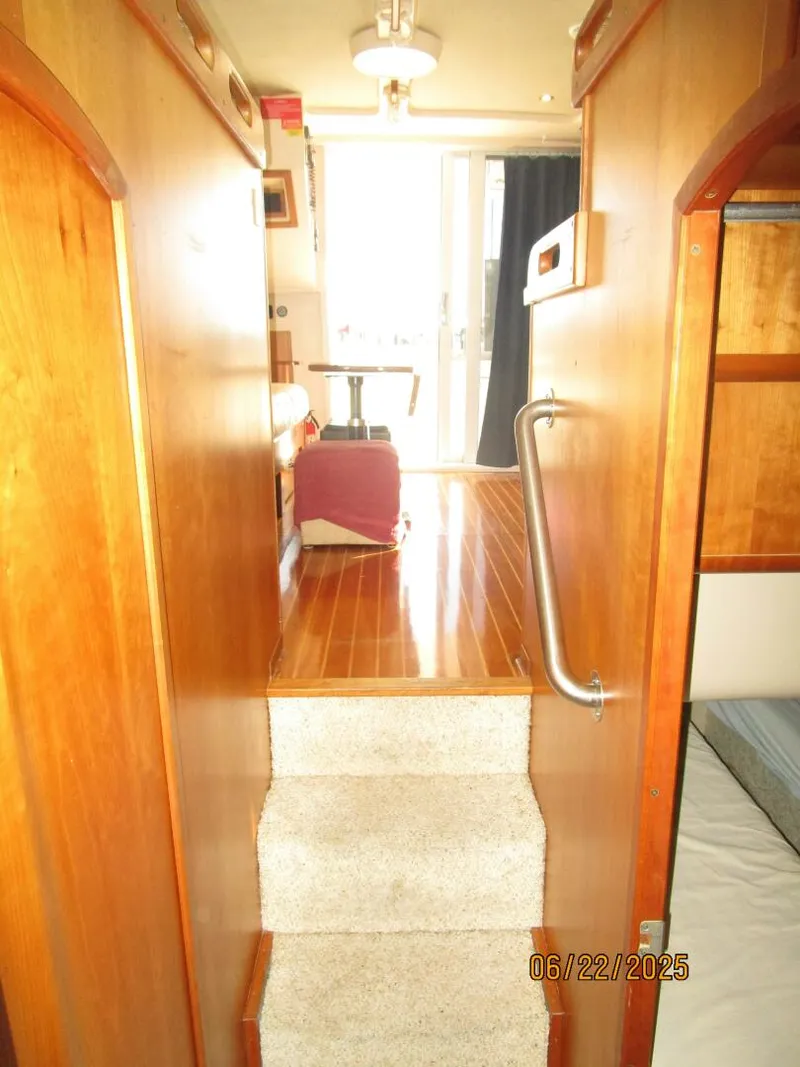Slide: The Image of 39' Mainship companionway aft - 5435748