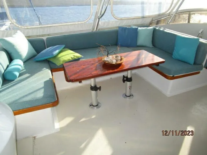 Slide: The Image of 72' DeFever flybridge port seating - 4045508