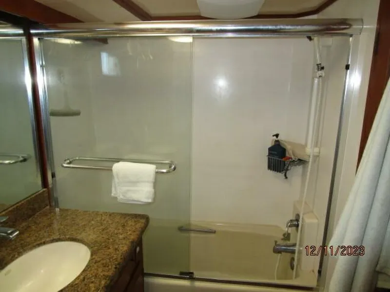 Slide: The Image of 72' DeFever master stateroom tub-shower - 4045539
