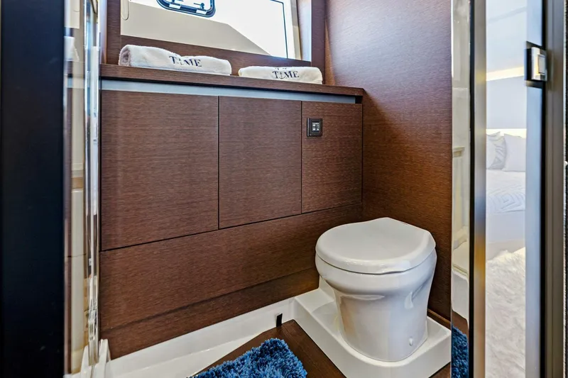 Slide: The Image of 2019 63 Prestige Flybridge - RT Time - Master Stateroom Head - 4199790
