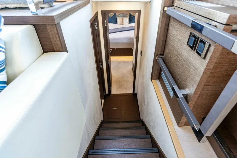 Slide: The Image of 2019 63 Prestige Flybridge - RT Time - Companionway to Staterooms - 4199796