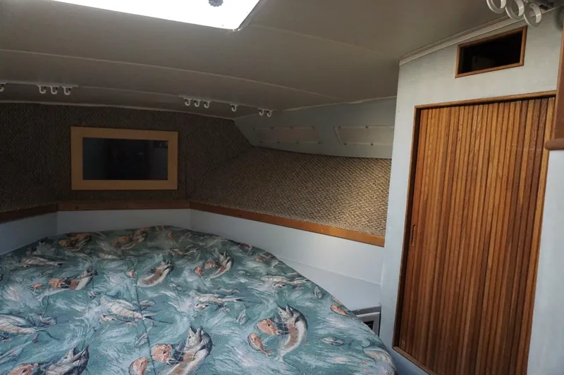Slide: The Image of 1987 37 Bertram 37 Convertible RIDGEBACK Fwd Stateroom  (3) - 4080313