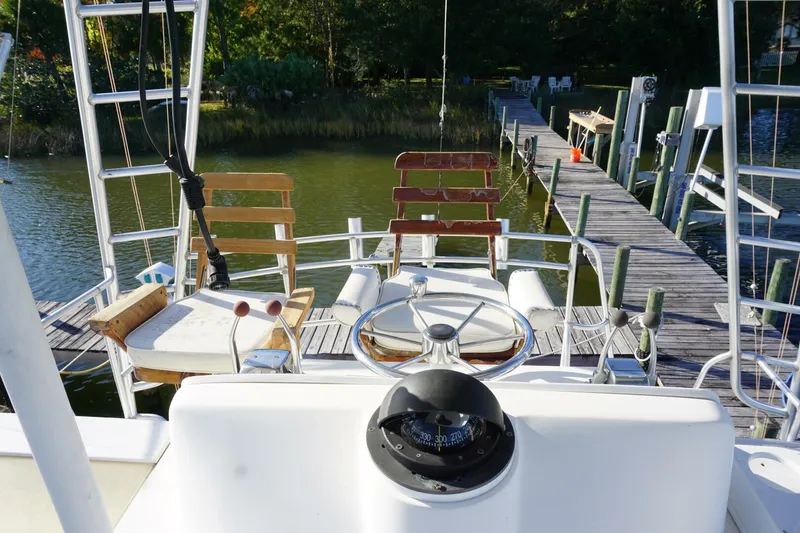 Slide: The Image of 1987 37 Bertram 37 Convertible RIDGEBACK Helm Chairs (1) - 4080350