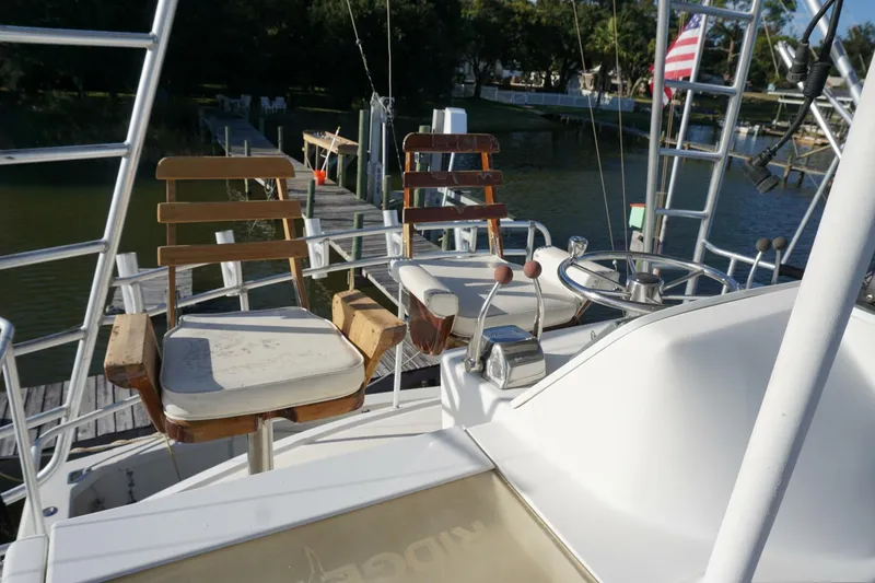 Slide: The Image of 1987 37 Bertram 37 Convertible RIDGEBACK Helm Chairs (2) - 4080355