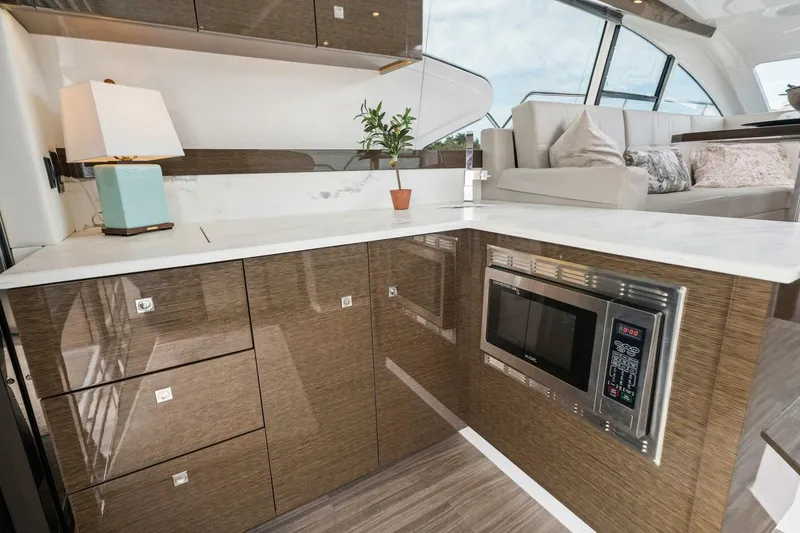 Slide: The Image of 2020 46 Cruisers Cantius - Sweet Caroline - Galley - 4114375