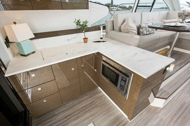 Slide: The Image of 2020 46 Cruisers Cantius - Sweet Caroline - Galley - 4114376