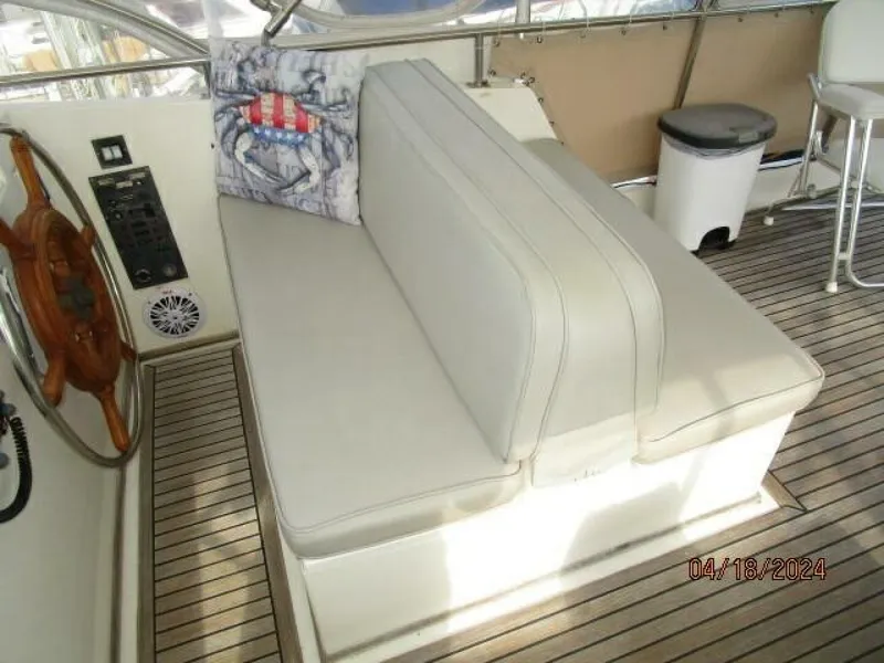 Slide: The Image of 46' Grand Banks flybridge starboard seating - 4315974