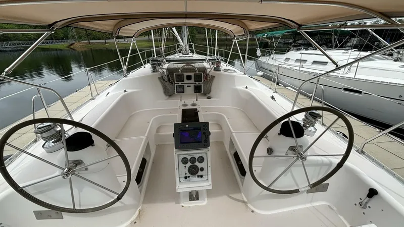 Slide: The Image of 1997 Catalina 400 Cockpit with electronics & engine controls - 4321342