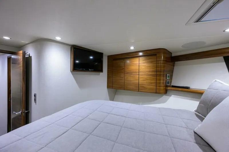 Slide: The Image of Viking 54 - TROUBLE FREE - Forward Stateroom 2024 Viking 54 Sport Coupe TROUBLE FREE - 4344253