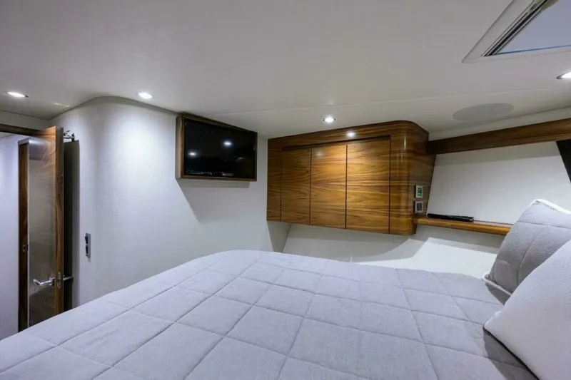 Slide: The Image of Viking 54 - TROUBLE FREE - Forward Stateroom 2024 Viking 54 Sport Coupe TROUBLE FREE - 7648980