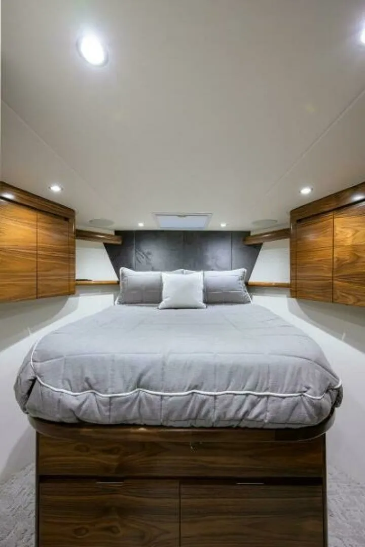 Slide: The Image of Viking 54 - TROUBLE FREE - Forward Stateroom 2024 Viking 54 Sport Coupe TROUBLE FREE - 7648978