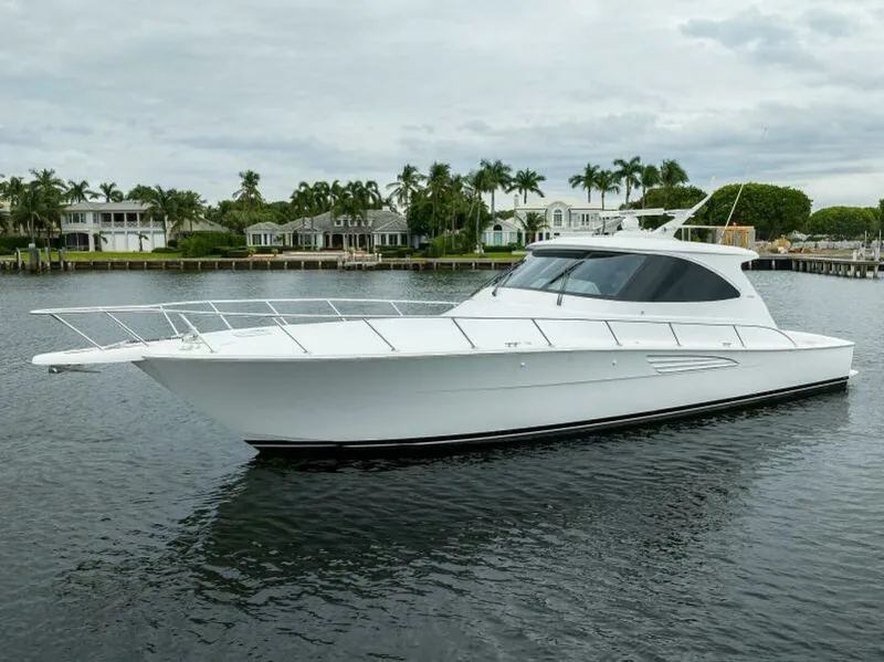 Slide: The Image of Viking 54 - TROUBLE FREE - Port Bow Profile 2024 Viking 54 Sport Coupe TROUBLE FREE - 7648998
