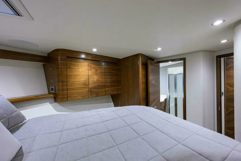 Slide: The Image of Viking 54 - TROUBLE FREE - Forward Stateroom 2024 Viking 54 Sport Coupe TROUBLE FREE - 7648979