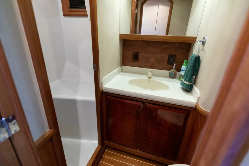 Slide: The Image of 1998 Miller Marine 60' Convertible CAT'N'AROUND-Guest Head - 4351081