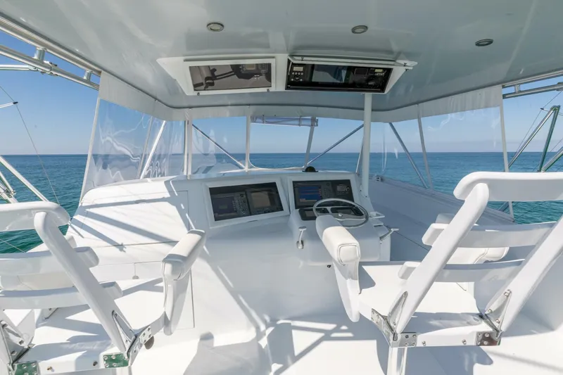 Slide: The Image of 1998 Miller Marine 60' Convertible CAT'N'AROUND-Helm 1 - 4351082