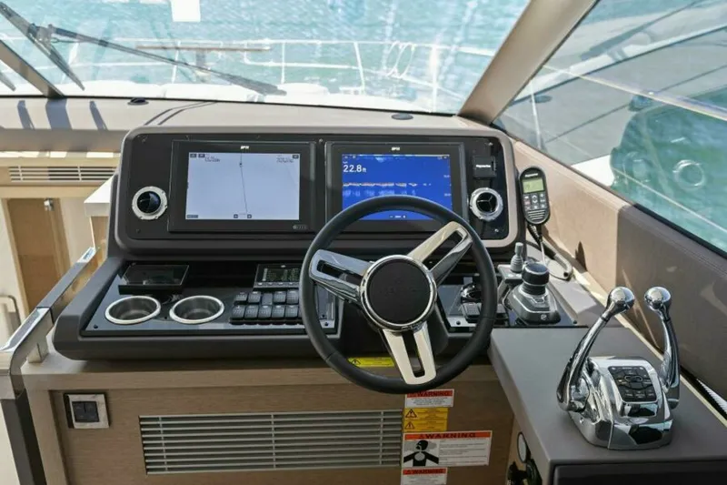 Slide: The Image of 2022 59 Prestige Flybridge - How Sweet It Its - Helm - 6096721