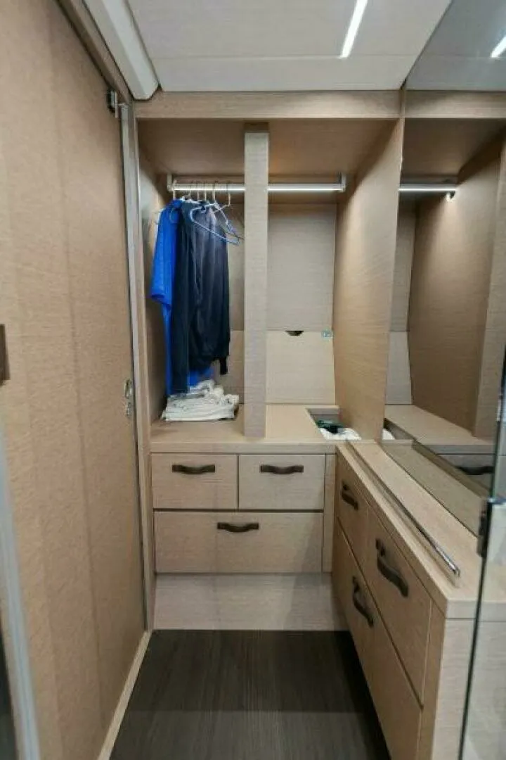 Slide: The Image of 2022 59 Prestige Flybridge - How Sweet It Its - Master Storage - 6096732