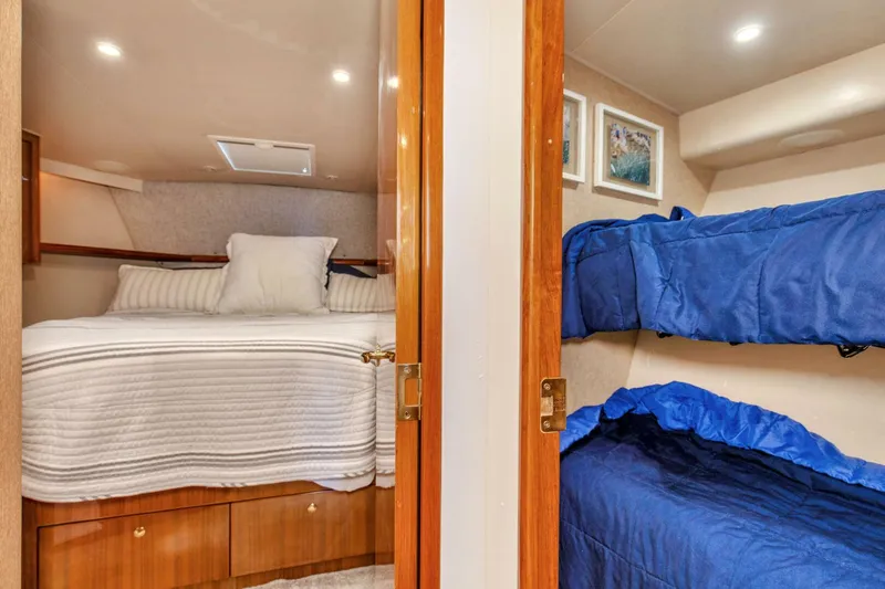 Slide: The Image of 2005 Viking 61 Enclosed Bridge _It Don_t Matta_ Starboard Stateroom (2) - 4387159