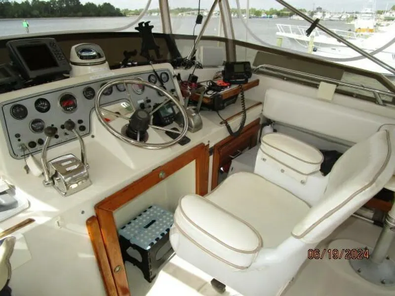 Slide: The Image of 40' Mainship flybridge helm1 - 4462845