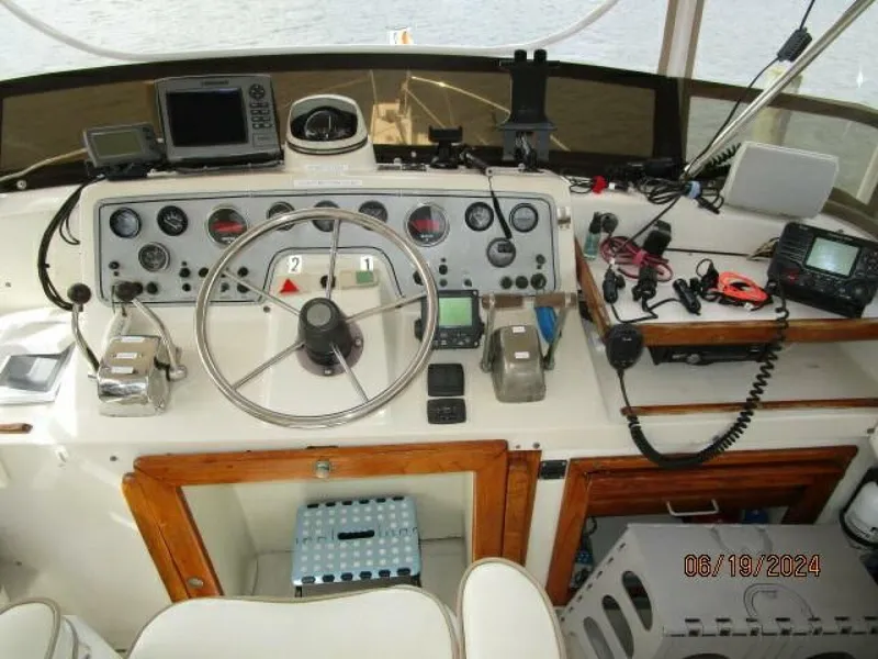 Slide: The Image of 40' Mainship flybridge helm2 - 4462846