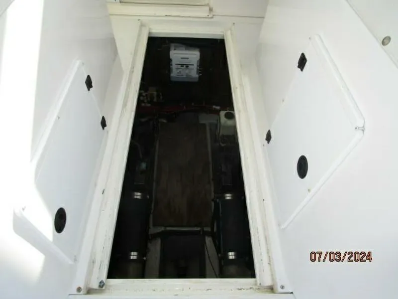 Slide: The Image of 33' Wellcraft engine room access1 - 4494725