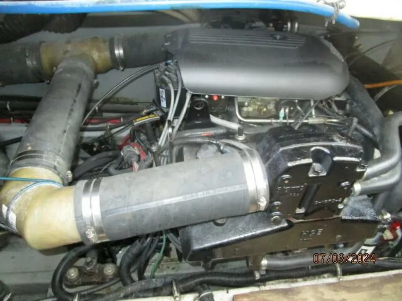 Slide: The Image of 33' Wellcraft port main engine - 4494757