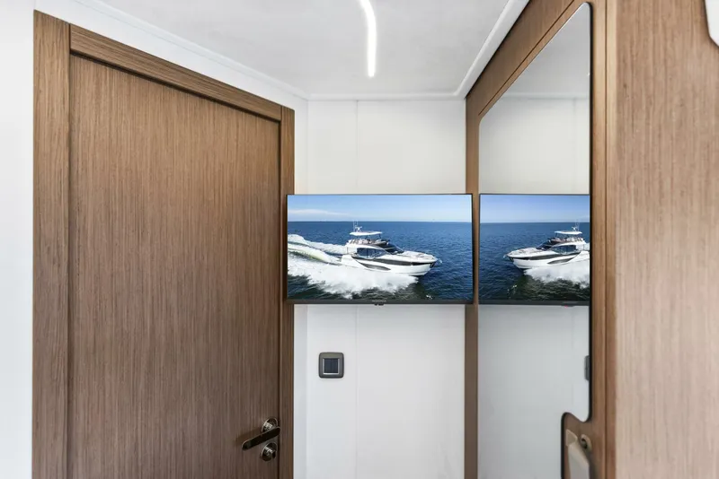 Slide: The Image of 2026 Prestige F5.7 Flybridge - Guest Suite TV - 5618525