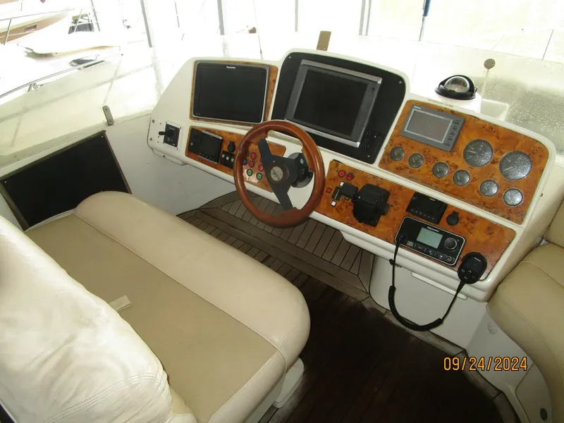 Slide: The Image of 47' Sealine flybridge helm1 - 4697439