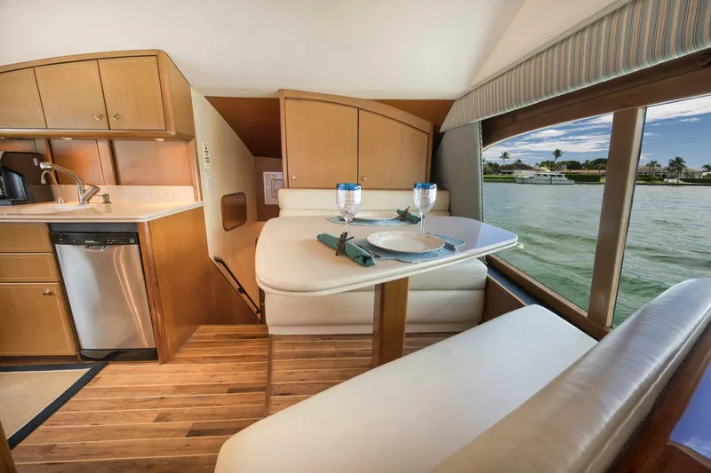 Slide: The Image of Ocean 57 Positive Attitude - Interior Dinette 2004 Ocean 57 Enclosed Bridge Positive Attitude - 4716000