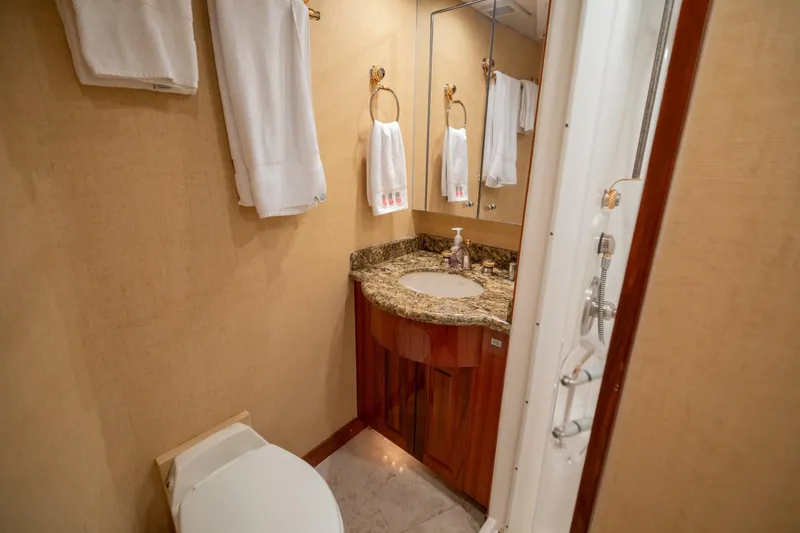 Slide: The Image of 2005 Hatteras 68 Convertible- Guest Head 1 - 4739257