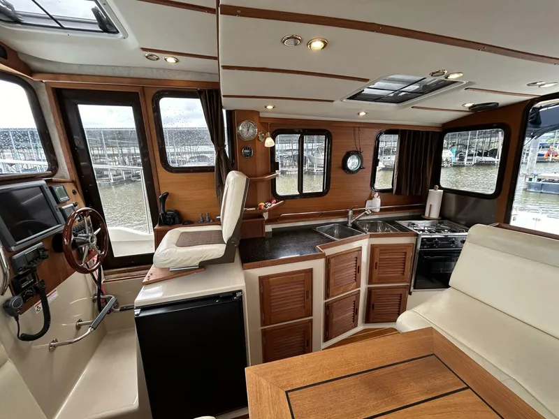 Slide: The Image of 29' Ranger Tugs salon starboard - 4776147